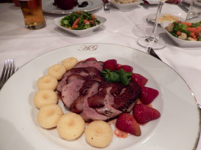 Pink duck with strawberry salad